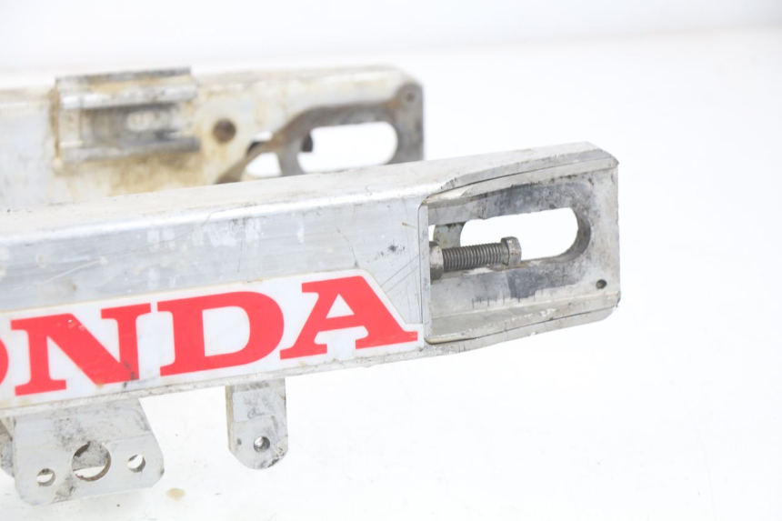 photo de SCHOMMELARM HONDA CR 125 (1989 - 1991) - Staat van het oppervlak