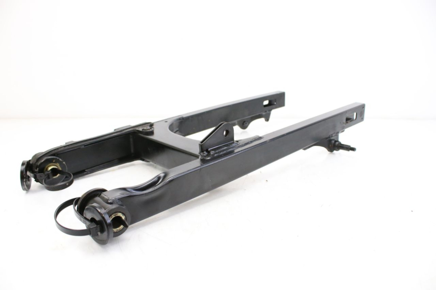 photo de SCHOMMELARM SYM HUSKY 125 (1999 - 2005) - Detail van het onderdeel