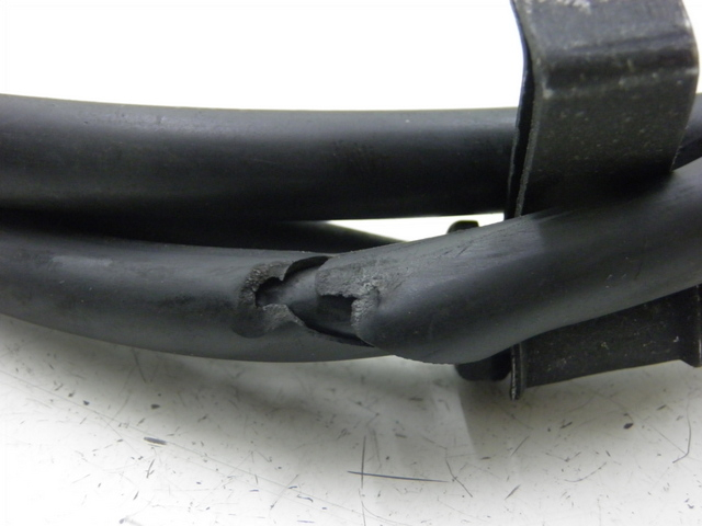 photo de ACHTERREMKABEL HONDA SH 125 (2005 - 2008) - Detail van het onderdeel