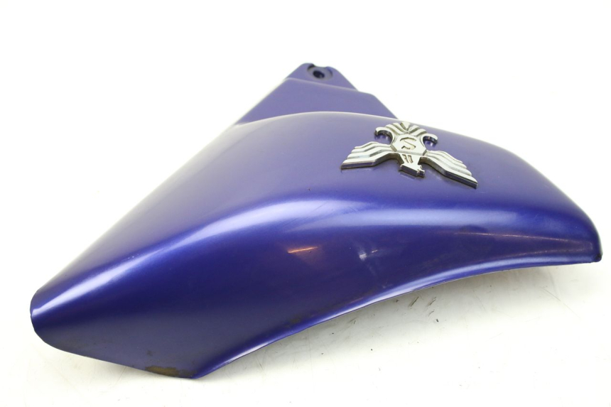 photo de RECHTER ZIJDE ONDERZITDEKSEL SYM HUSKY 125 (1999 - 2005) - Andere kijkhoek