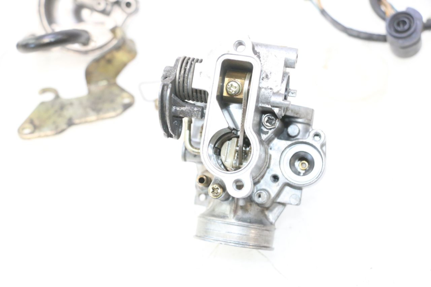 photo de VERGASER HONDA FES PANTHEON 2T 125 (1998 - 2002) - Profielaanzicht
