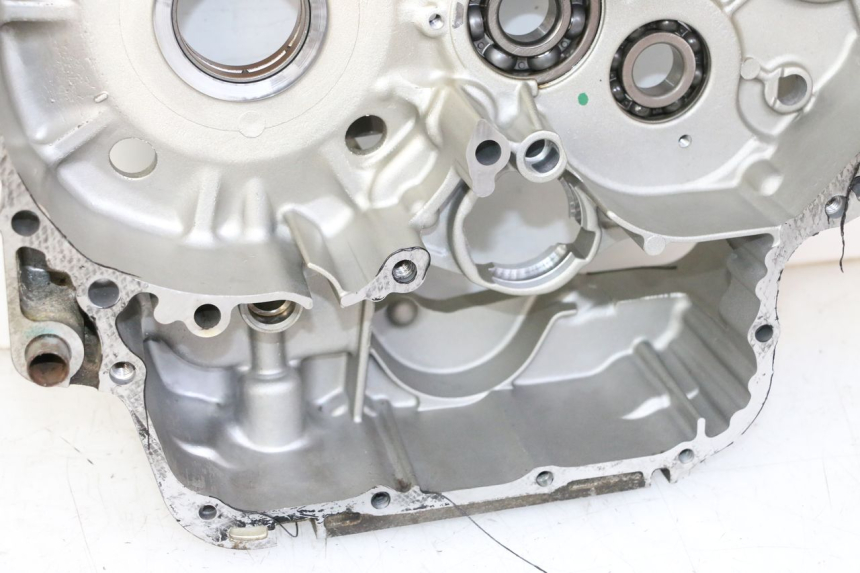 photo de ONDERKANT MOTORBLOK HONDA NTV DEAUVILLE 650 (2001 - 2006) - Zoom op kwaliteit