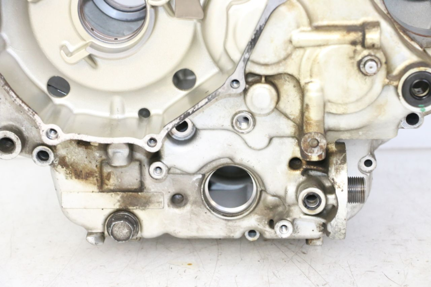 photo de ONDERKANT MOTORBLOK HONDA NTV DEAUVILLE 650 (2001 - 2006) - Zoom op gebruiksstaat