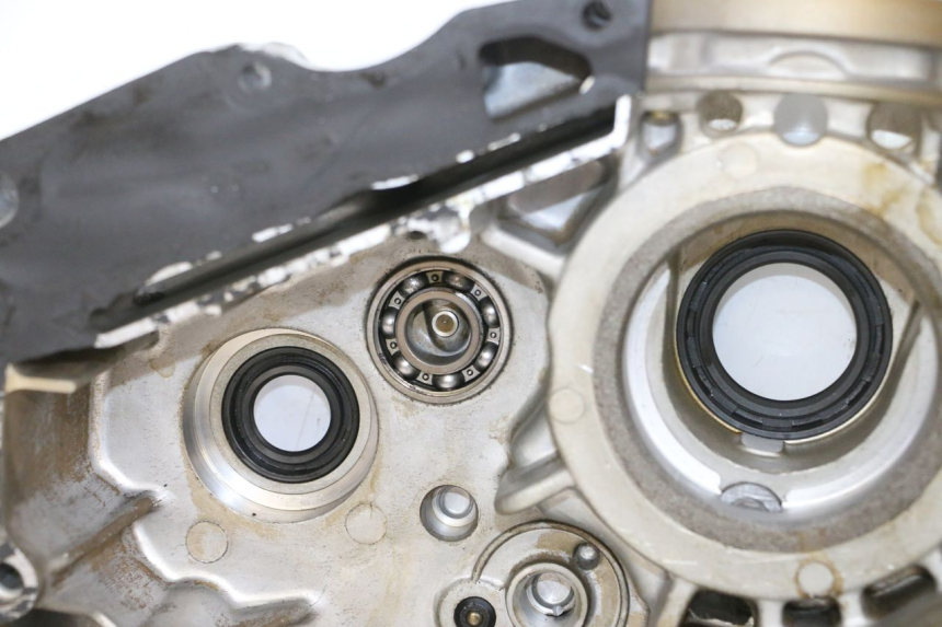 photo de ONDERKANT MOTORBLOK KYMCO ZING 125 (1997 - 2003) - Detail van het onderdeel