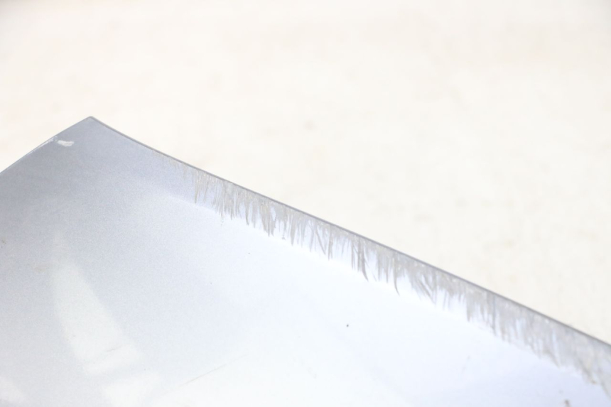 photo de VOORSTE LINKER ZIJPANEEL SYM JOYMAX 125 (2010 - 2017) - Gecontroleerd onderdeel