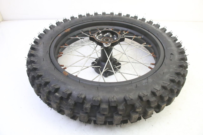 photo de ACHTERWIELVELG EN BAND ORION DIRT BIKE 125 - Detail van het onderdeel