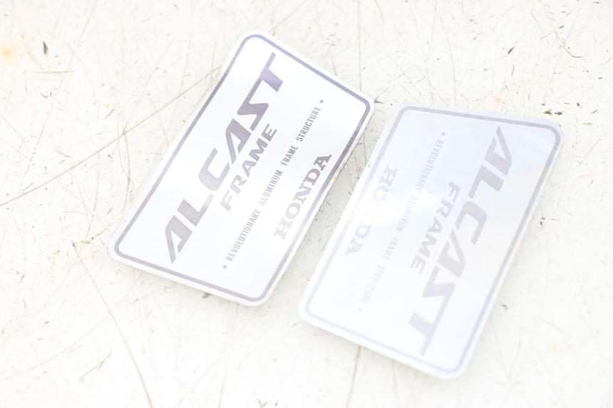 photo de MERKLOGO HONDA NSR R 125 (1994 - 2003) - Zoom op gebruiksstaat