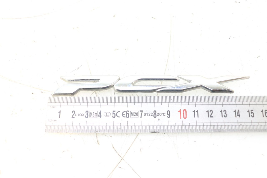 photo de MERKLOGO HONDA PCX (JF28) 125 (2009 - 2011) - Detail van het onderdeel