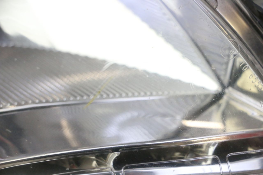 photo de RECHTS VOORKOPLAMP PEUGEOT SATELIS 125 (2013 - 2018) - Detail van het onderdeel