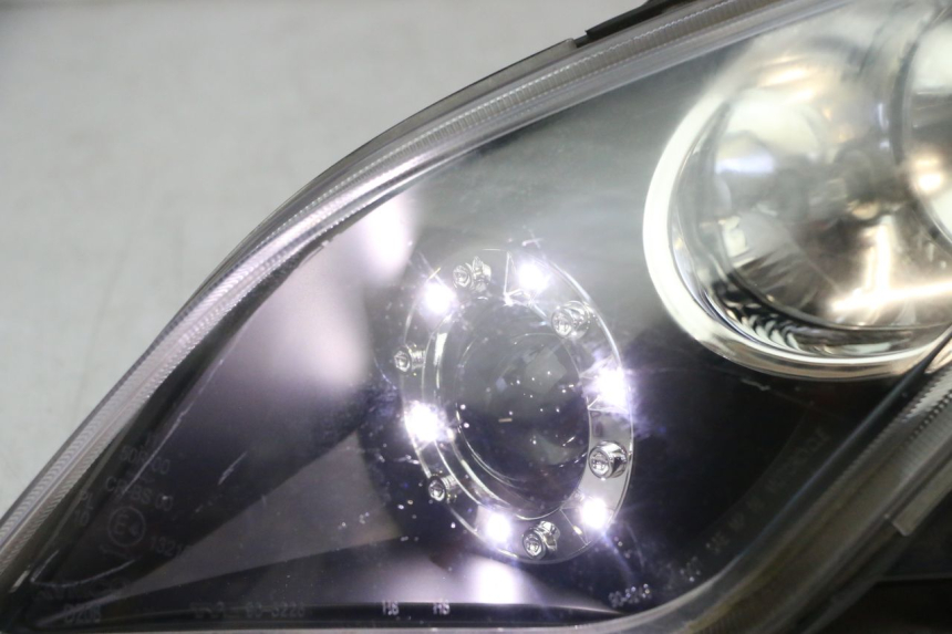 photo de LINKER VOORKOPLAMP KYMCO DINK STREET 125 (2009 - 2014) - Detail van het onderdeel
