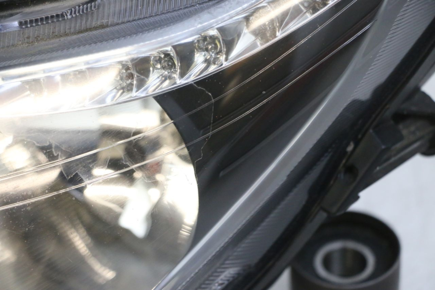 photo de LINKER VOORKOPLAMP SYM GTS EVO 125 (2009 - 2013) - Kenmerkende details