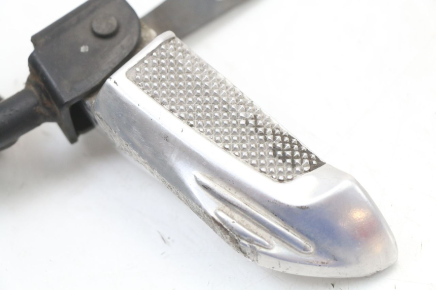 photo de PLAAT ACHTERSTE VOETSTEUN LINKS HONDA NHX LEAD 110 (2008 - 2010) - Detail van het onderdeel