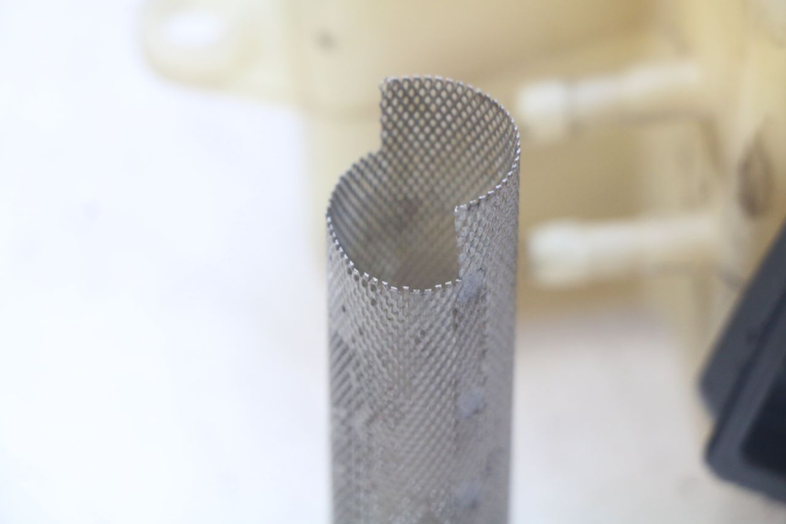 photo de OLIEBEHUIZING PEUGEOT ELYSEO 125 (1999 - 2004) - Zoom op gebruiksstaat