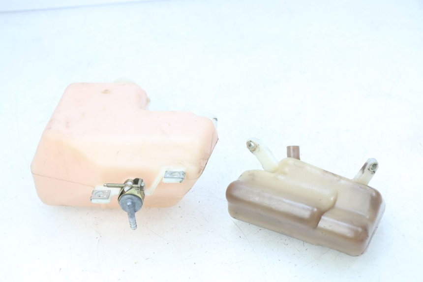 photo de OLIEBEHUIZING HONDA FES PANTHEON 2T 125 (1998 - 2002) - Zoom op gebruiksstaat