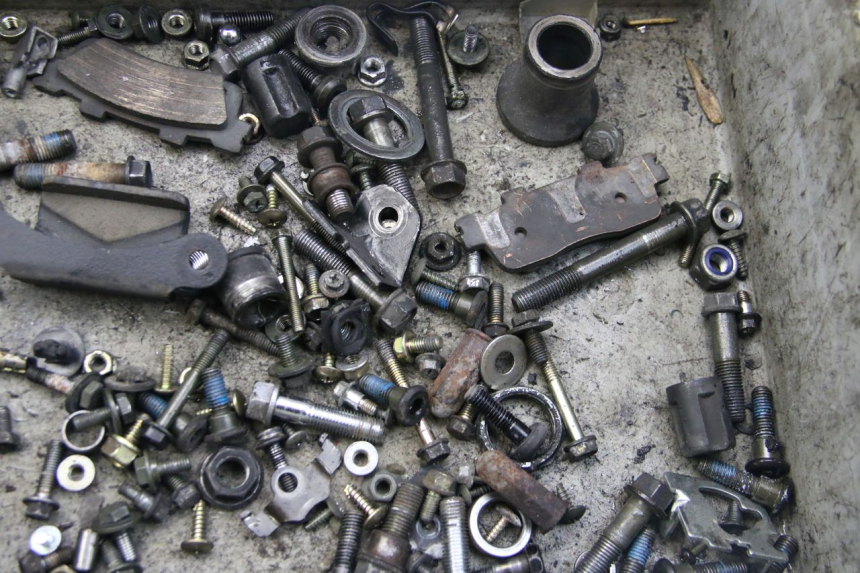 photo de ZAK SCHROEVEN EN BEVESTIGINGSMATERIAAL KYMCO DINK STREET 125 (2009 - 2014) - Detail van het onderdeel