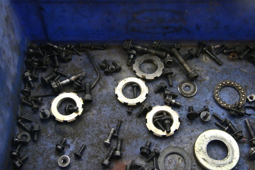 photo de ZAK SCHROEVEN EN BEVESTIGINGSMATERIAAL PEUGEOT KISBEE 4T 50 (2018 - 2022) - Detail van het onderdeel