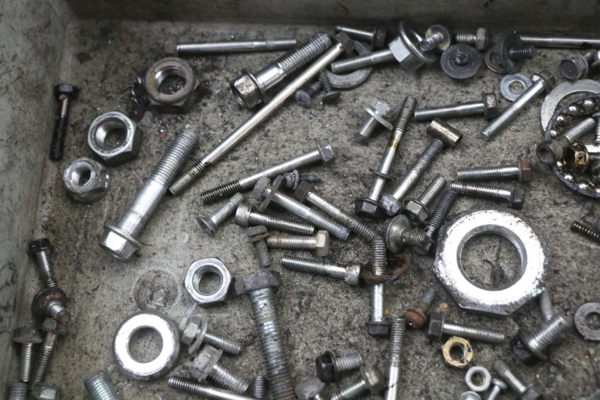 photo de ZAK SCHROEVEN EN BEVESTIGINGSMATERIAAL HONDA NHX LEAD 110 (2008 - 2010) - Detail van het onderdeel